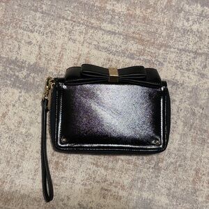 Sleek Black Wristlet with Bow Detail